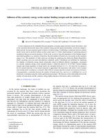 Influence of the symmetry energy on the nuclear binding energies and the neutron drip line position